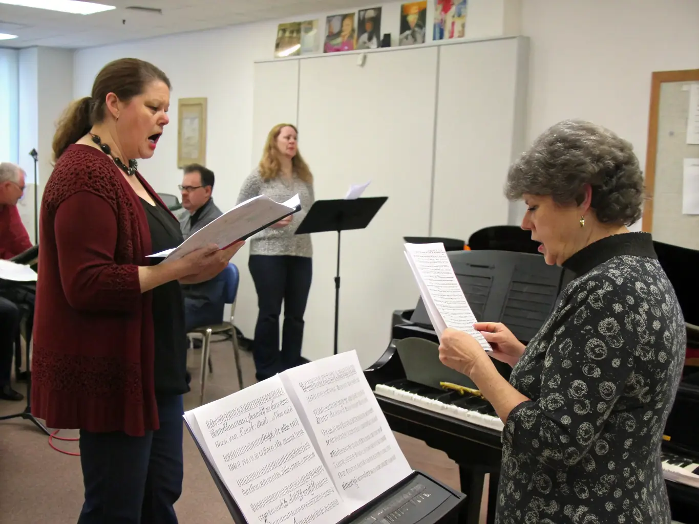 A group of choir members participating in a vocal warm-up exercise during a singing workshop, with a focus on proper breathing techniques and vocal projection.
